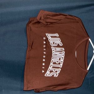 Brow crop top size medium no hole or stains